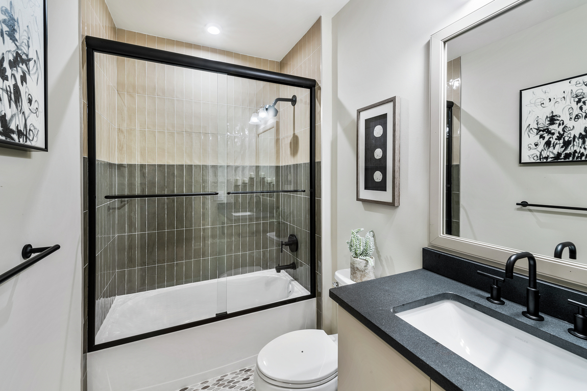 bathroom design with shower and bath combo