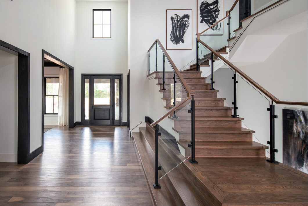 spacious staircase design with glass siding