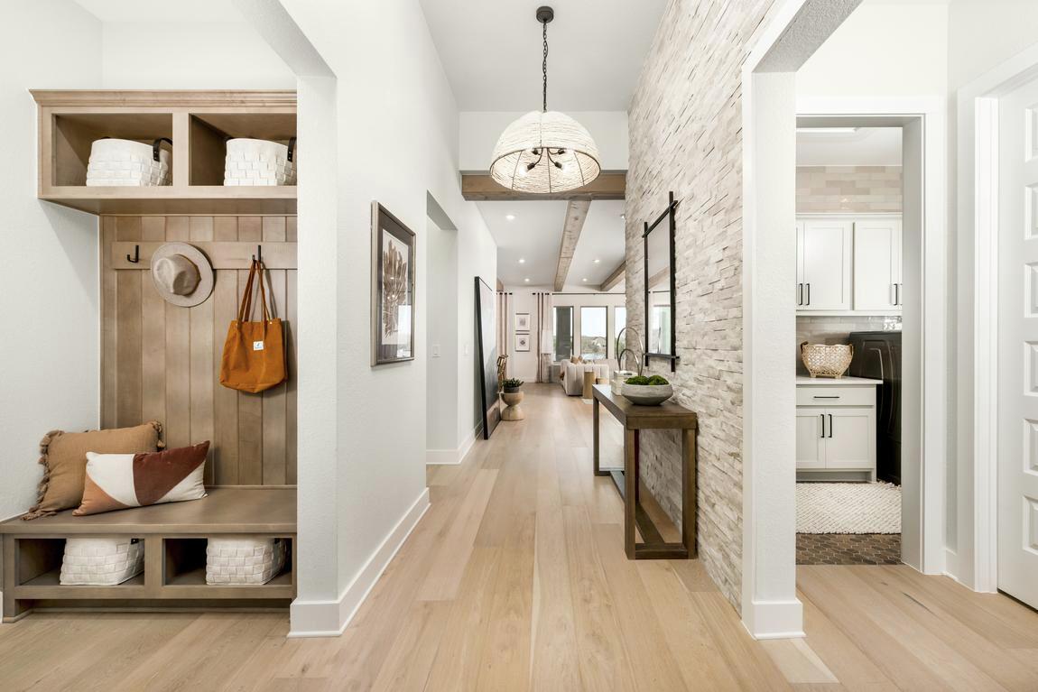 Charming foyer design with adjacent mudroom