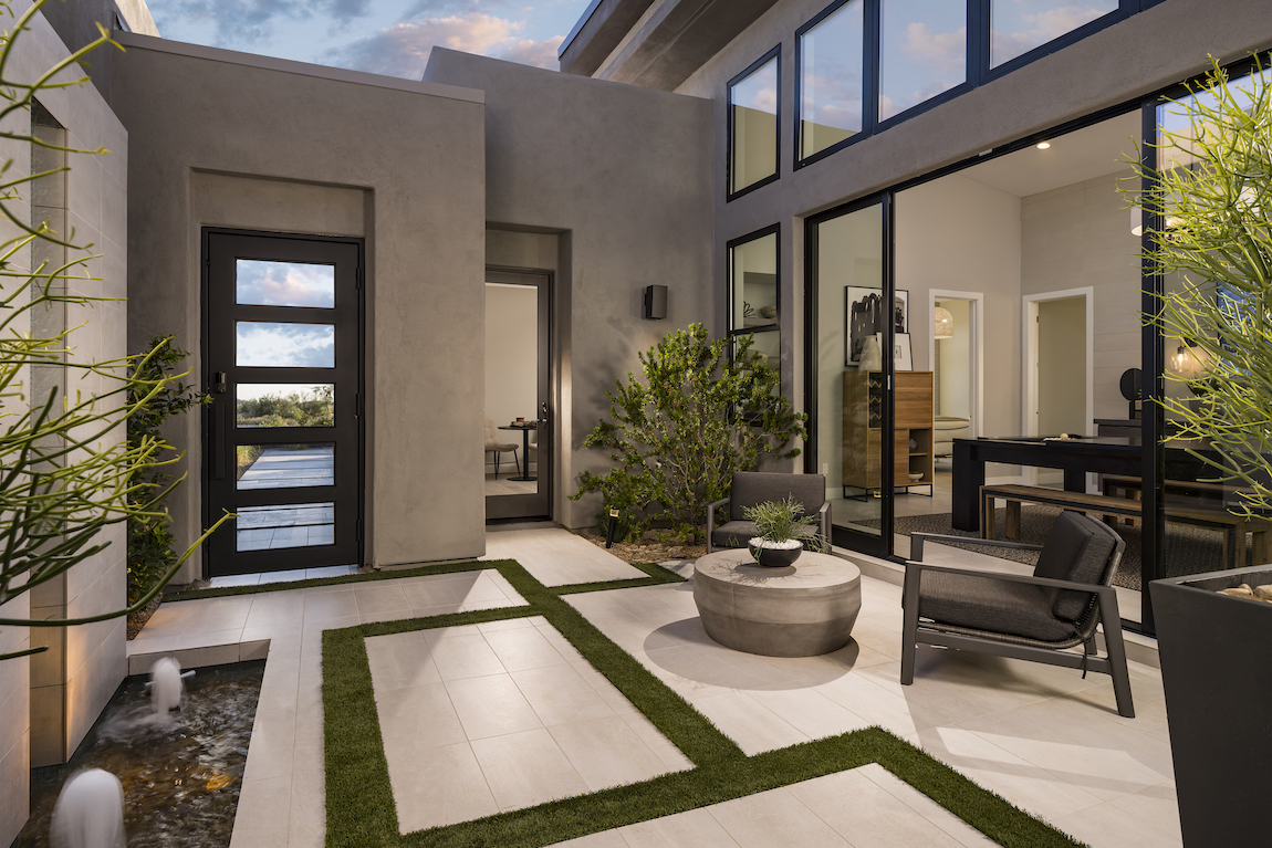 Luxe courtyard design featuring seamless indoor-outdoor living transition