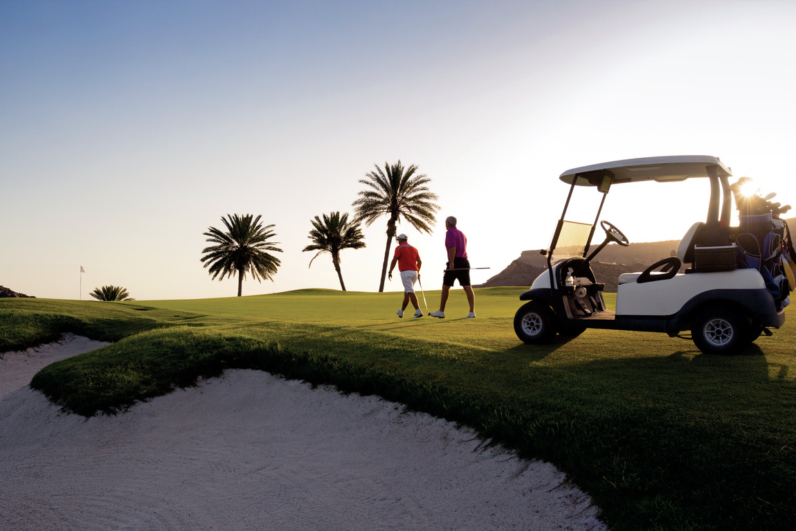 people playing golf