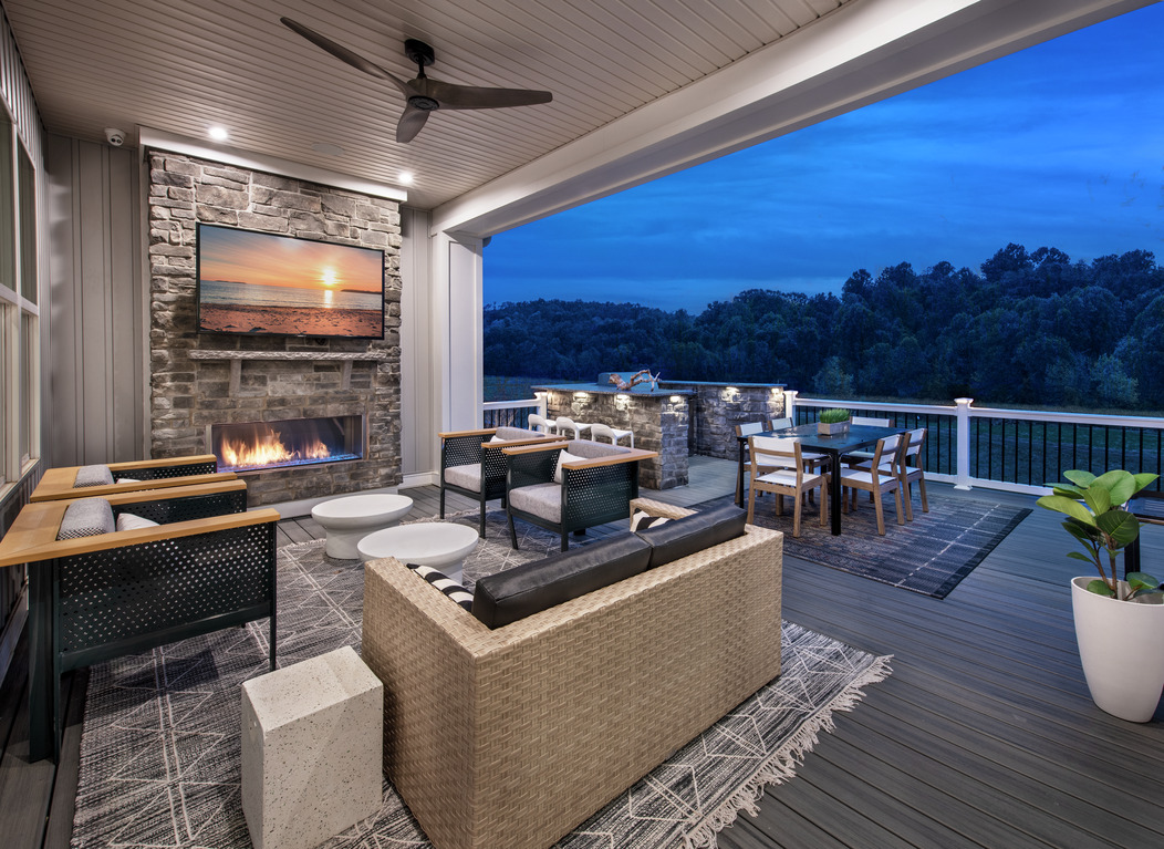 Beautiful patio deck with outdoor kitchen and balcony views
