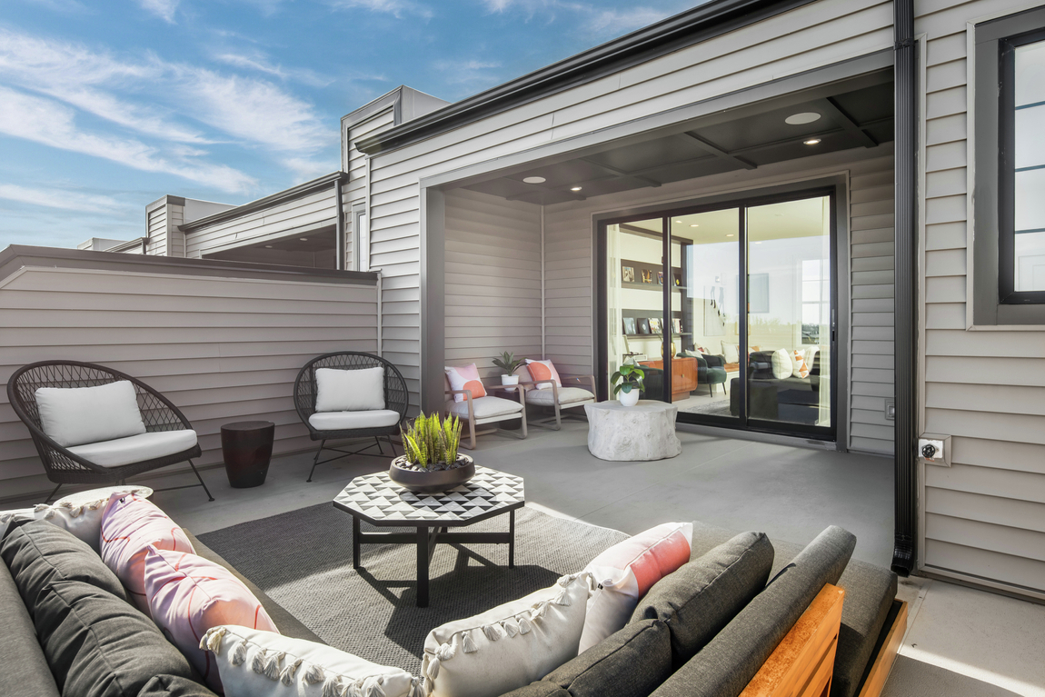 Luxury patio deck in a private backyard with seating area