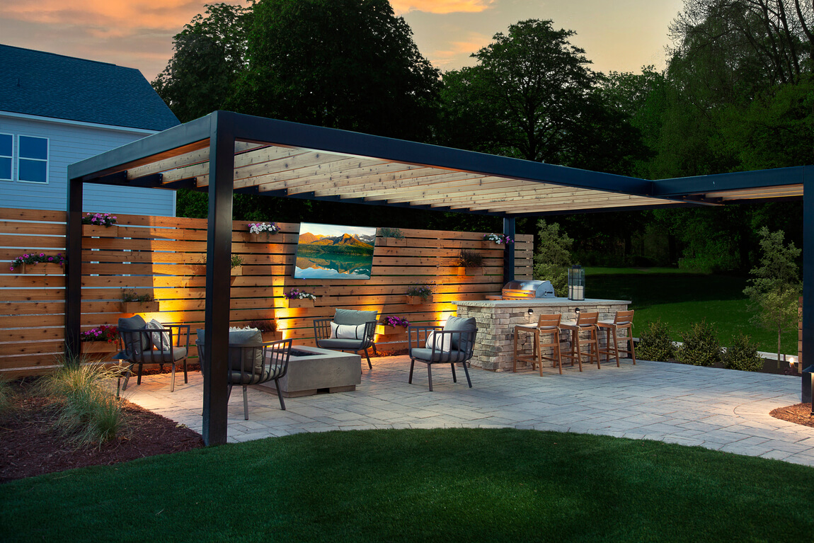 Luxury outdoor lighting for a beautiful patio with outdoor kitchen and entertainment area
