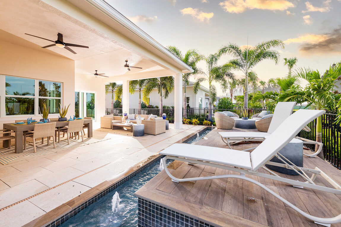 Beautiful patio with luxury pool and dining area