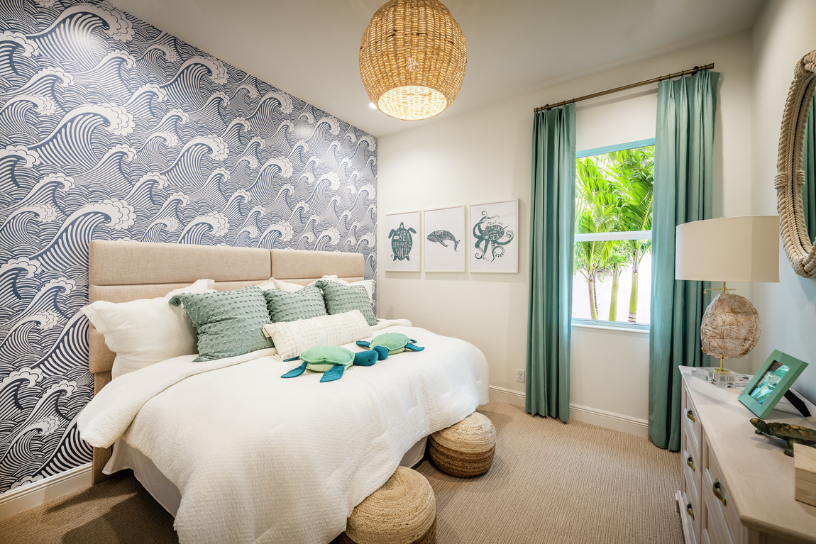 coastal bedroom design highlighted by wave-pattern wallpaper design