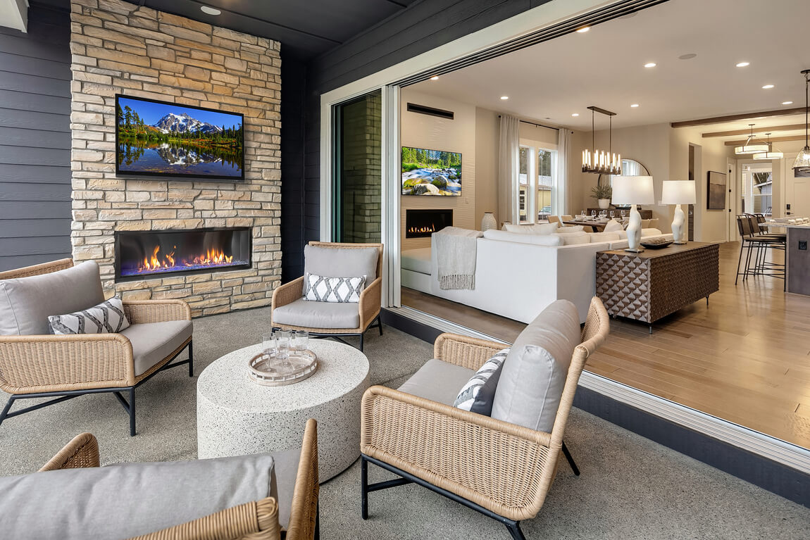 entertaining patio design featuring TV and fireplace