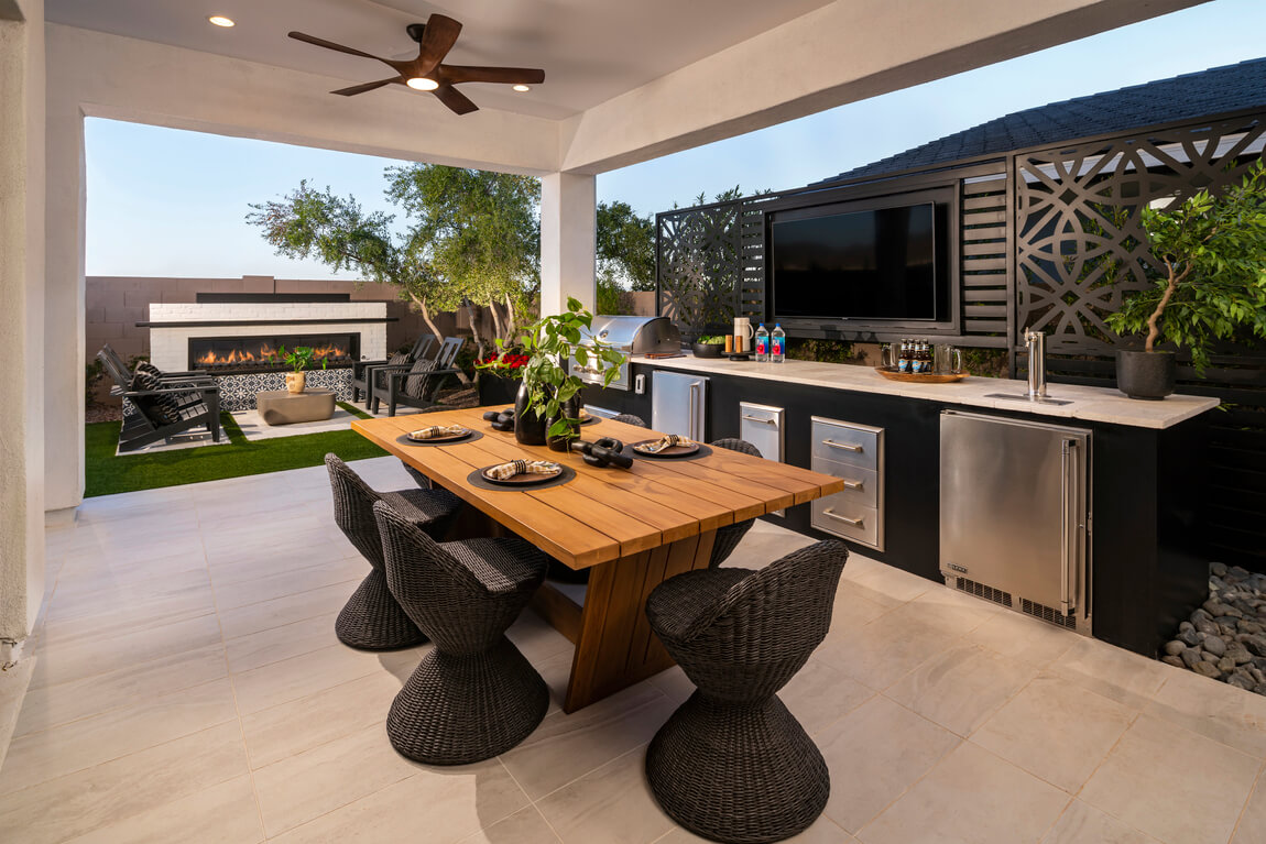 Indoor outdoor dining complete with mini bar and wood table