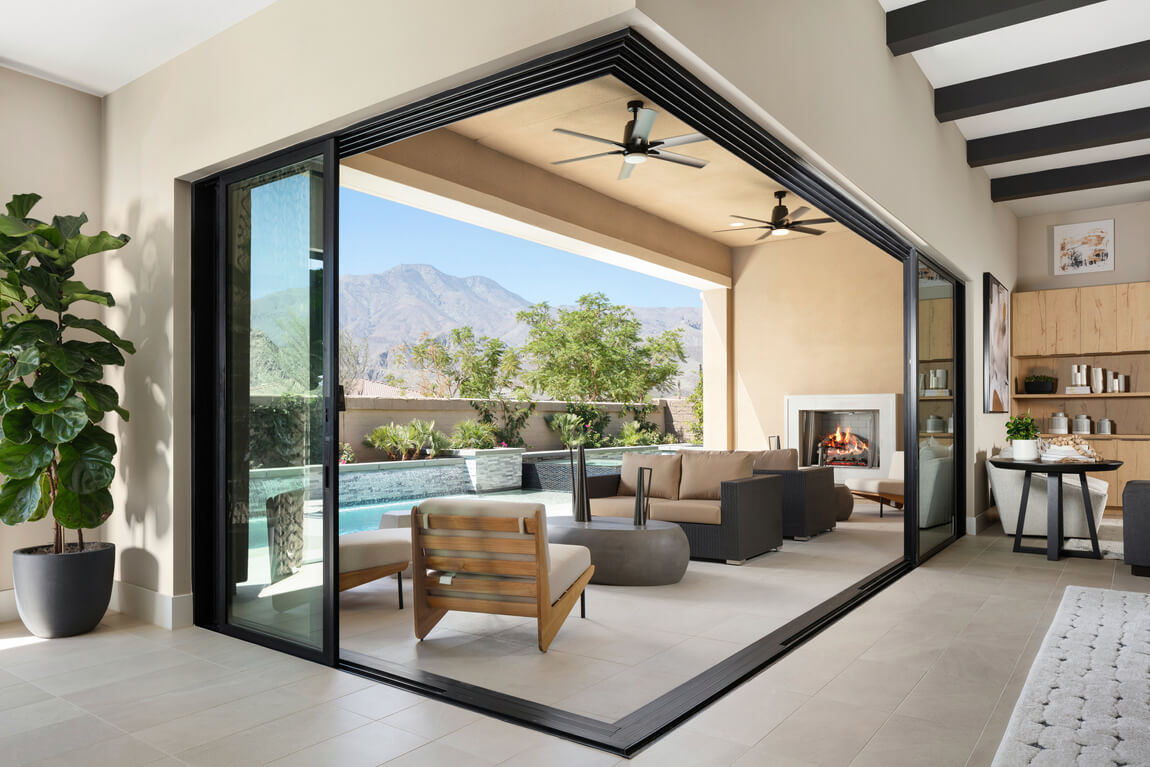 Luxury patio design featuring expansive sliding glass doors
