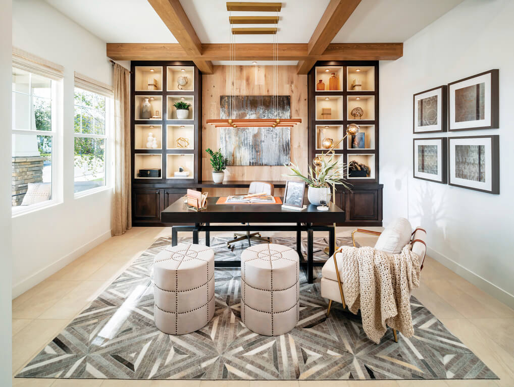 Rustic home office featuring focal built-in shelving unit