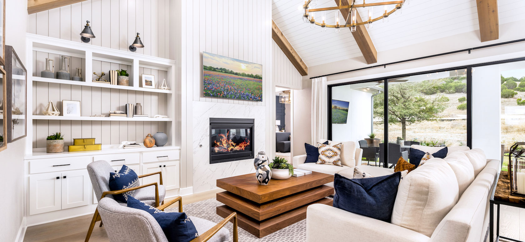 Living room with fireplace and cathedral ceiling