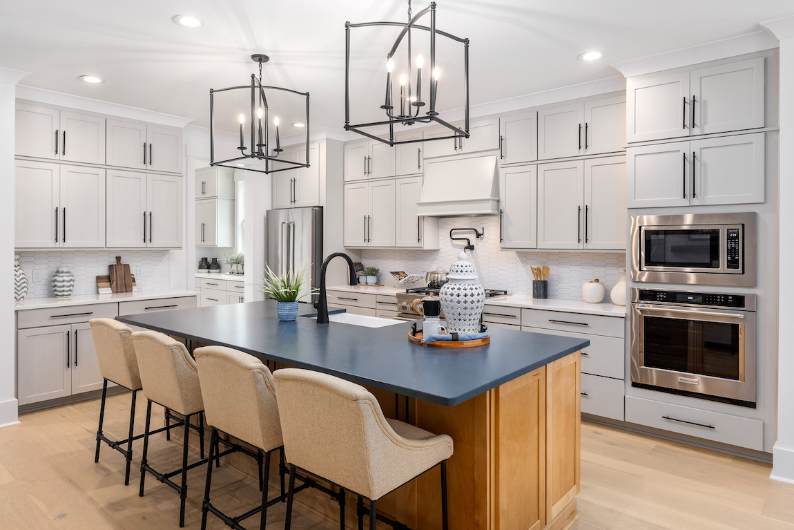 Transiitonal kitchen in home design at Forest Edge by Toll Brothers