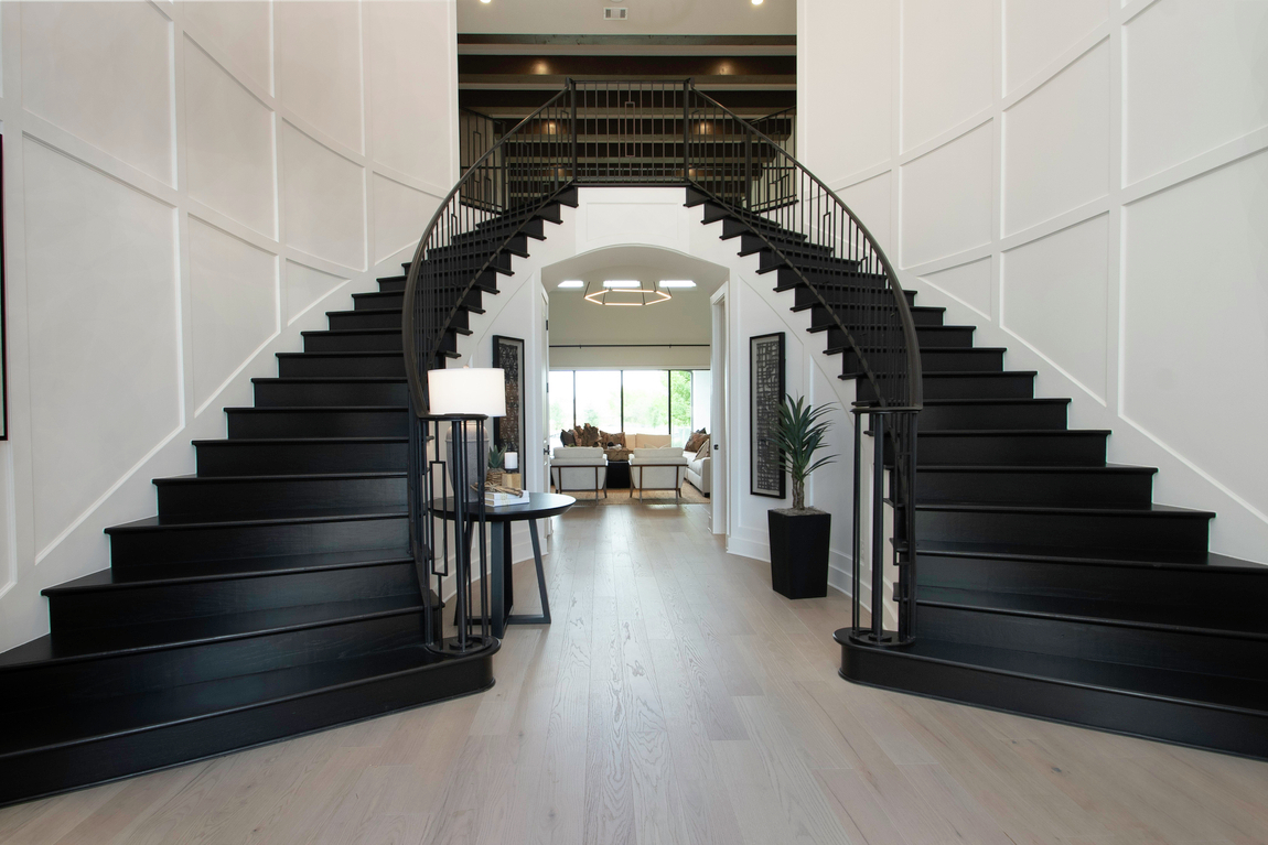 Grand Staircase with luxury design in traditional foyer
