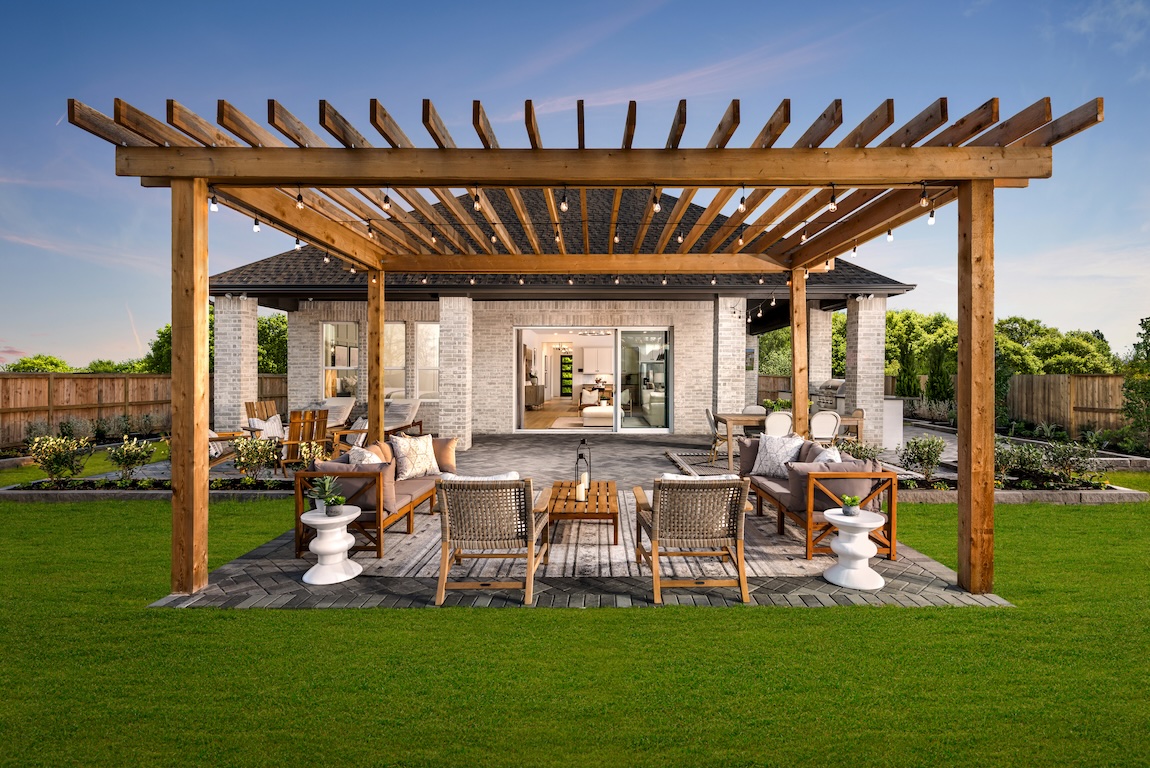 Outdoor living space featuring cabana with string lights