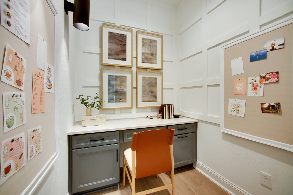 Small family workstation with bulletin boards and wall paneling