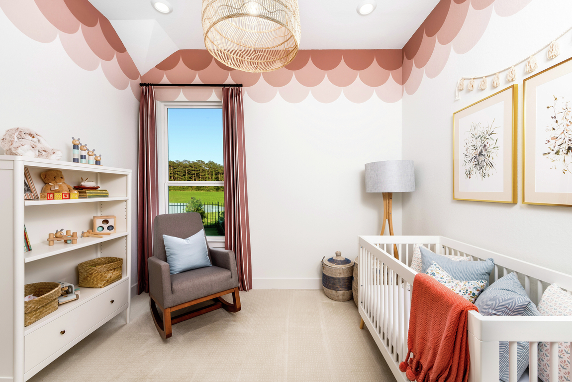 modern nursery with scalloped border ceiling accents