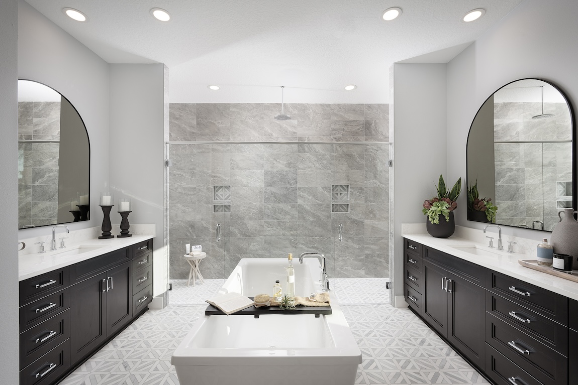 Luxury bathroom design with dual vanity and bath tub in the center