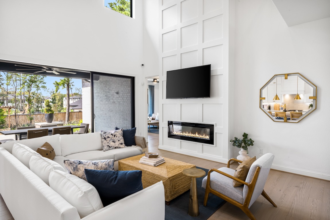 great room featuring coffered fireplace design