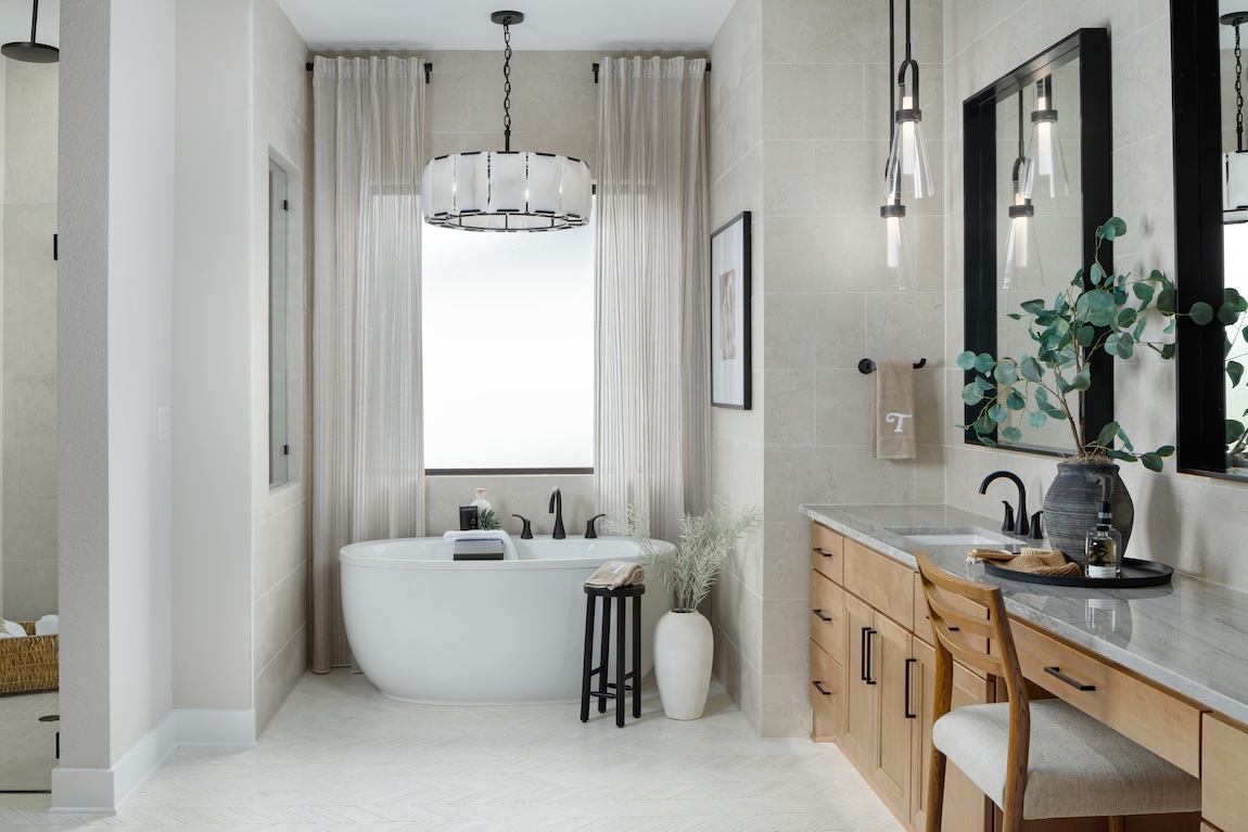 freestanding bathtub with matte black fixtures