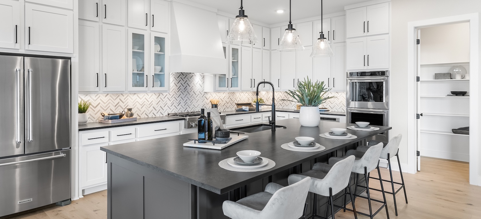 modern kitchen with herringbone tile