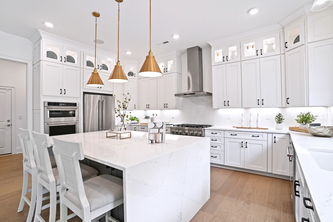 modern kitchen with marble waterfall island