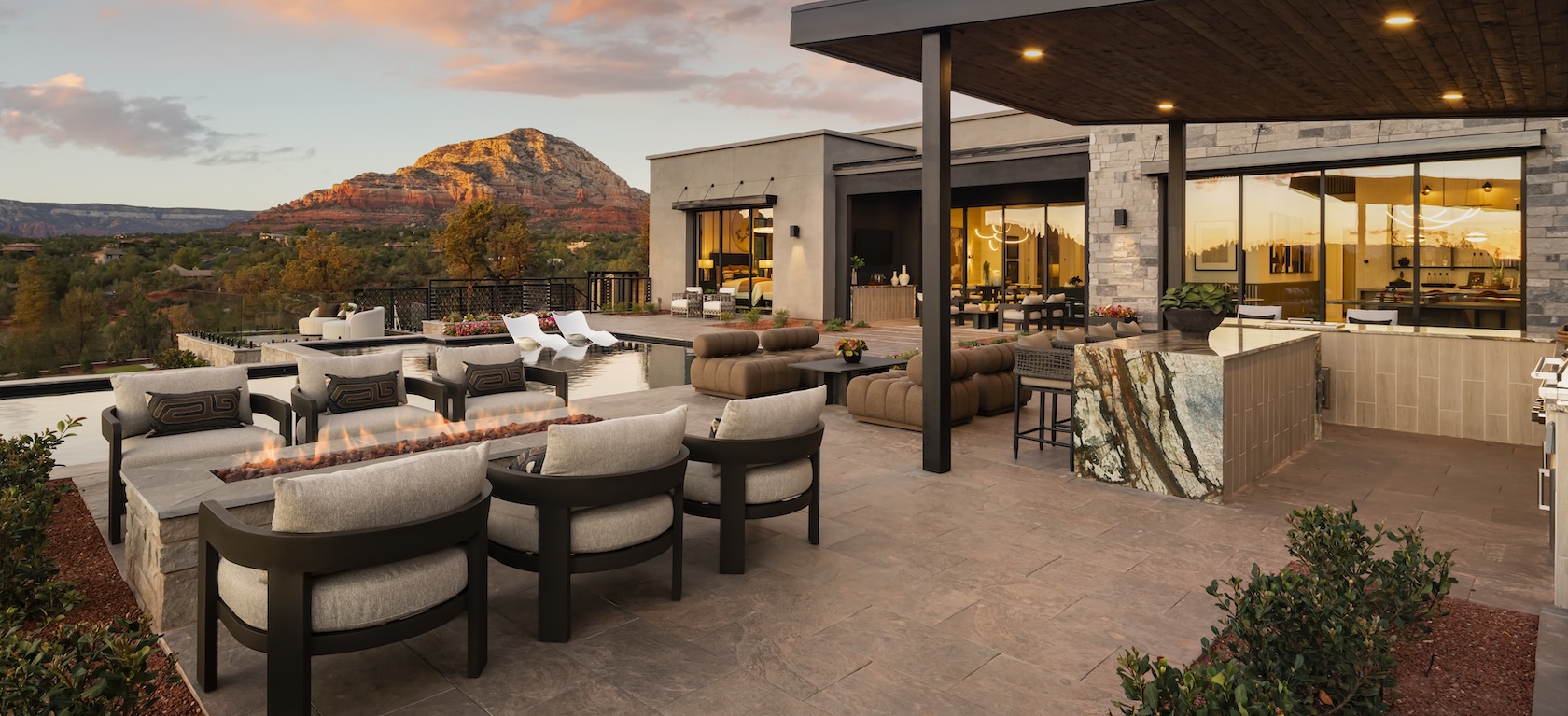 outdoor patio with fireplace and seating