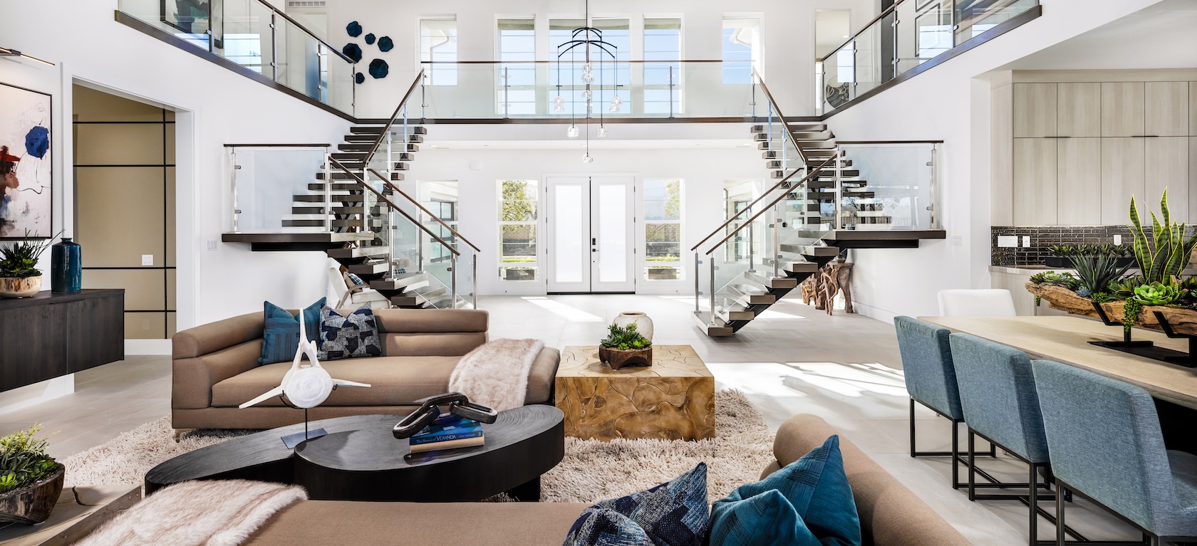 living room with dual staircase