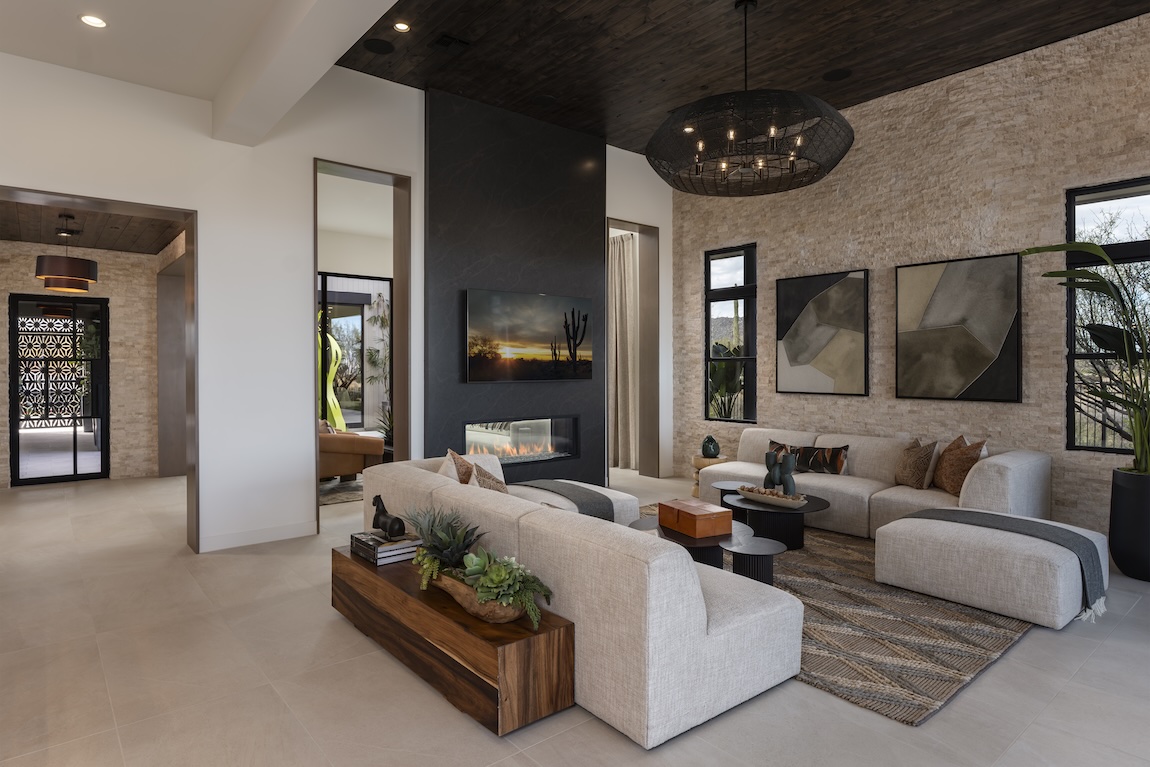 modern living space with black accent fireplace