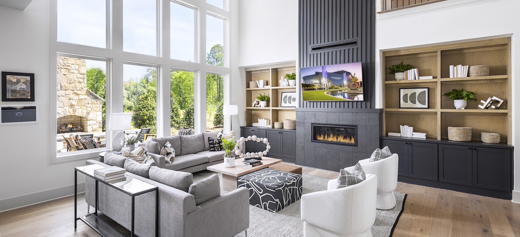 great room with fireplace and shelving
