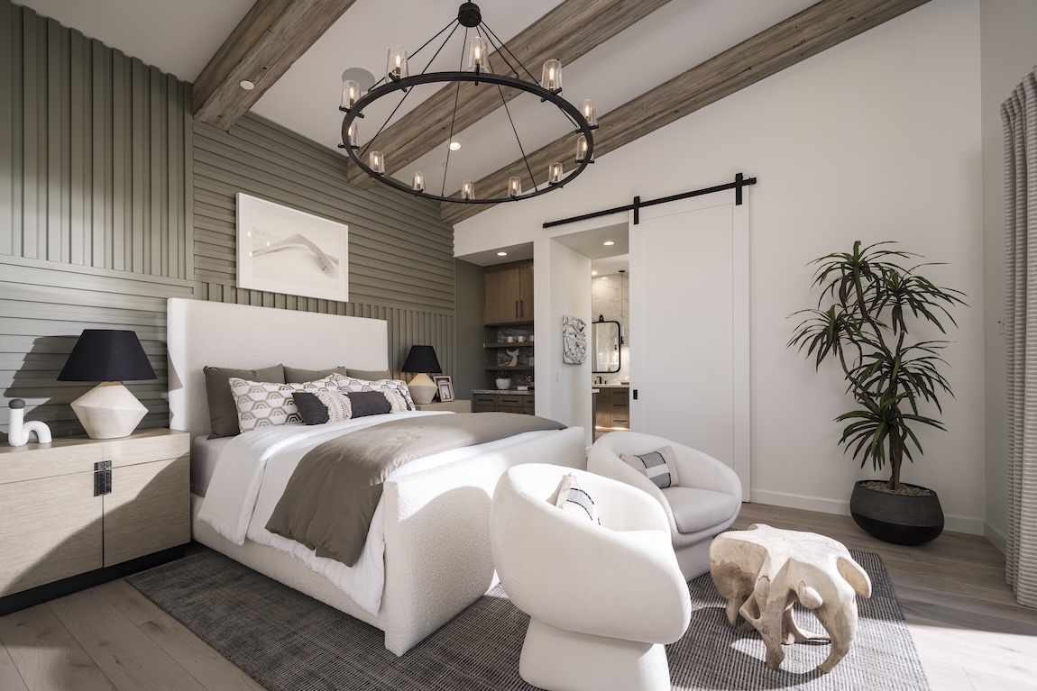 charming contemporary farmhouse bedroom design with accent wall and circular chandelier design