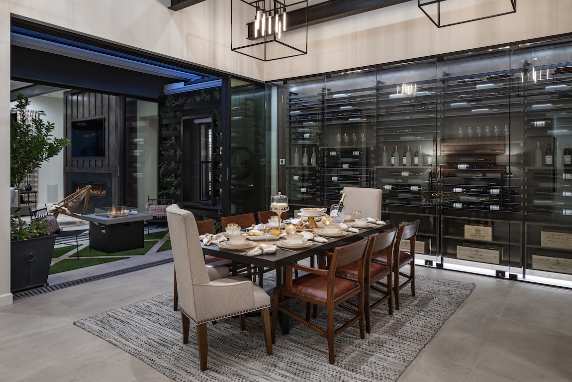 Dining room featuring seasonal decor with access to outdoor fire pit area