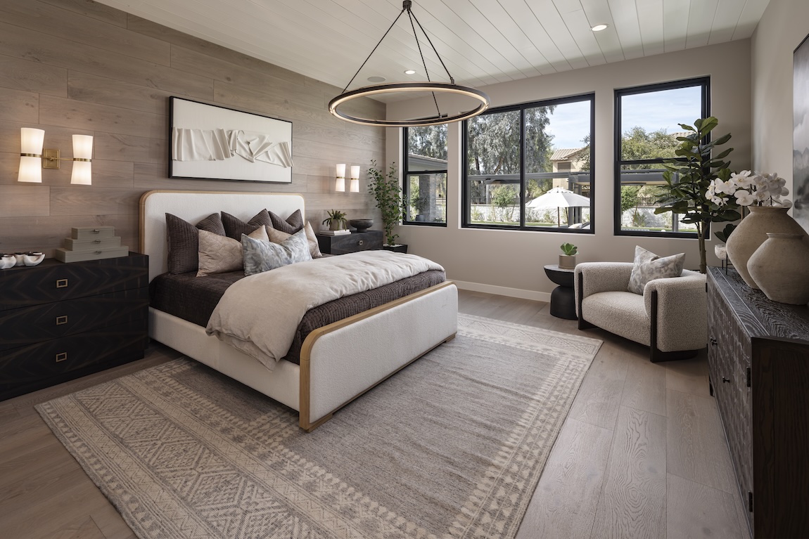 Primary bedroom design with neutral palette
